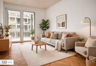 Stilvolles Wohnen mit Balkon über den Dächern der Stadt