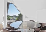 Weitblick: Extravagante Dachgeschosswohnung am Schafberg