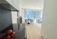 Waterfront Vibes im DC2 Tower – 2 Zimmer mit 15 m² Freifläche &amp; Kaiserwasser-Panorama