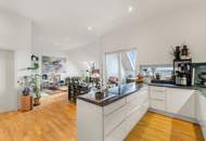 Wohnen über den Dächern von Graz mit Blick auf den Schlossberg: Exklusive Stadtwohnung mit Terrasse