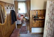 Bungalow mit (Feuchtigkeitsschäden) Garage und Nebengebäude zu verkaufen
