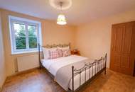 Seensucht am Irrsee – Gartenwohnung mit Badehütte