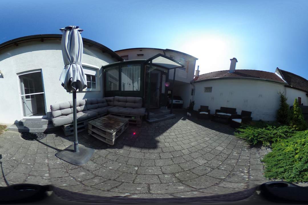 Einfamilienhaus mit Garage & Wintergarten in Ortsrandlage