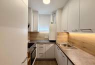 Helle Dachgeschosswohnung mit sonniger 7 m² Westterrasse und Garagenplatz in absoluter Ruhelage