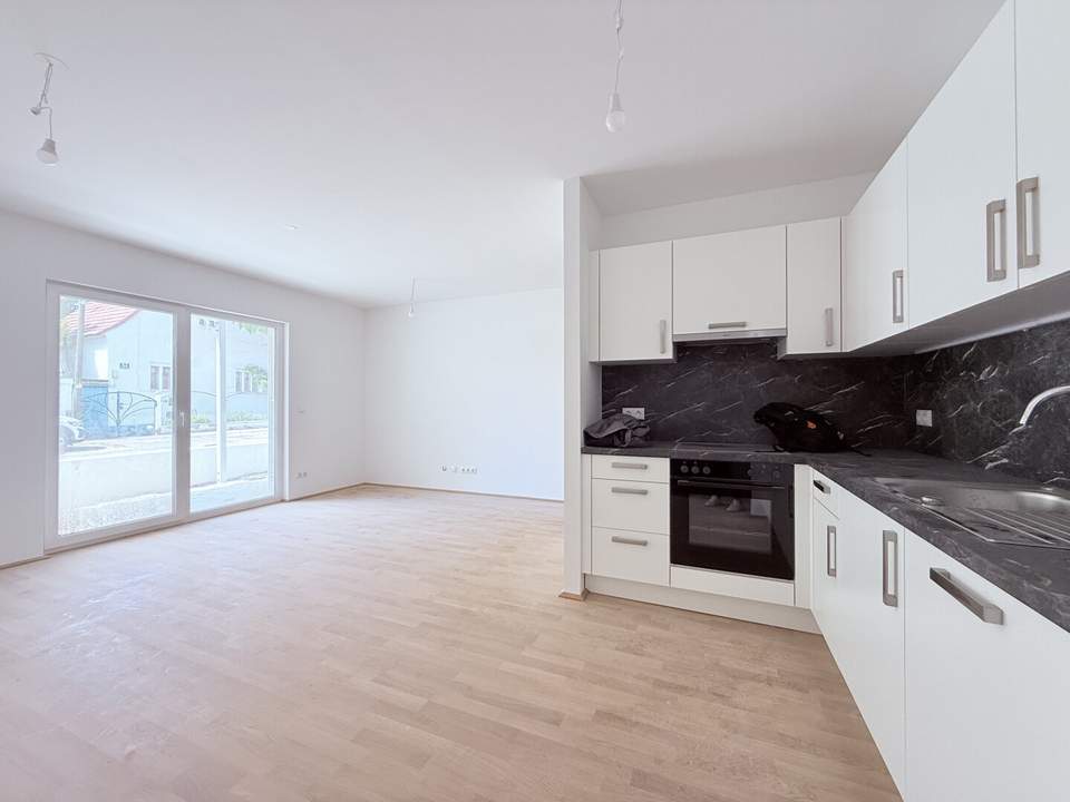 Erstbezug - Provisionsfreie und freifinanzierte Anlegerwohnung! Schöne 3 Zimmerwohnung mit Garten