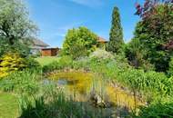 Charmanter Bungalow mit großem Garten, Photovoltaik & Teichanlage