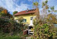 Entzückendes Einfamilienhaus mit Gartenoase in sonniger Lage
