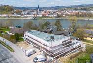 ERSTBEZUG! Traumhafte 4-Zimmer-Wohnung mit herrlichem Donaublick mit Eigengarten &amp; Terrasse zu verkaufen!