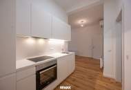 Sanierter Altbau mit modernem Neubau