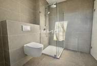 Exklusive 2-Zimmer-DG-Wohnung mit Weitblick und außergewöhnlichem Lichteinfall