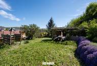 Gepflegtes Einfamilienhaus mit 2 Wohneinheiten, Garten/Terrasse &amp; 3 Garagen in sonnige Ruhelage!