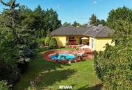 Licht, Luft und Freiheit: Bungalow mit großem 1.622 m2 Garten und Pool