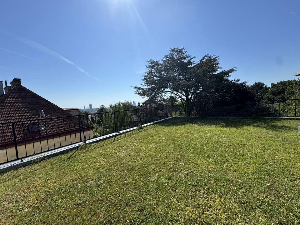 Rückzugsort in bester Lage - mit Dachgarten & Garage!