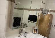 Top ausgestattetes GARTENAPARTMENT mit einer EXTRA TERRASSE und einem TIEFGARAGENPLATZ