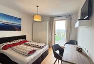 Architektenhaus in sonniger Ruhelage mit Spiral-Weinkeller, Infinity Pool und Burgblick