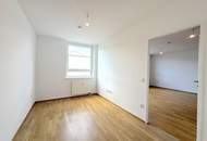 Hofseitig orientierte Zwei-Zimmer-Wohnung mit Einbauküche