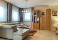 Sonniges Einfamilienhaus mit gepflegtem Garten, Terrasse, Balkon und Doppelgarage