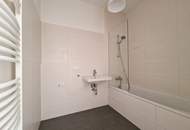 Schicke Neubauwohnung mit kl. Garten in idyllischer Ruhelage