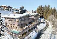 Neubau: Tiroler Chalets mit Blick in die Bergwelt