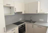 Moderne Klein-Wohnung mit herrlichem Balkon und Tiefgargenparkplatz