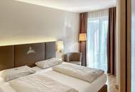 Wohntraum am Wörthersee: Exklusives Appartement mit Terrasse, Seeblick und Seezugang (inkl. 4 Baderechte)