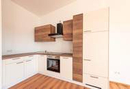 Neubau mit Qualität: Helle Wohnung mit großer, überdachter Terrasse