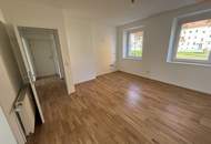 Sonnendurchflutete 2-Zimmer-Wohnung mit herrlichem Grünblick im beliebten Münichholz – liebevoll saniert, mit modernem Wohlfühlbad, praktischen Wohnräumen und perfekter Anbindung für alle, die Ruhe und Stadtnähe zugleich schätzen!