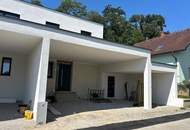 Neu gebaute Doppelhaushälfte mit großem 3fachcarport in beliebter Siedlung