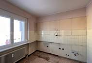 4-Zimmer-Eigentumswohnung - renovierungsbedürftig