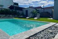 Einziehen, eintauchen, genießen – Ihr Zuhause mit beheizbarem Pool