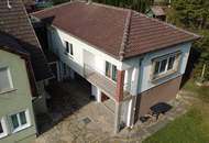 Vielseitiges Mehrfamilienhaus mit Charme und einladendem Garten