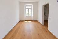 Klein & fein! Umfassend sanierte 2-Zimmer-Wohnung mit hochwertiger Ausstattung + moderner Luftwärmepumpe + rundum saniertes Altbauhaus