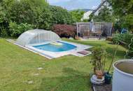 Einfamilienhaus mit Pool und großem Garten in verkehrsgünstiger Lage