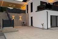 MODERN LIVING - Neuwertige Doppelhaushälfte mit 2 Terrassen und Doppelcarport in ruhiger Aussichtslage