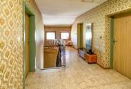 Wohnhaus und vier Bauparzellen