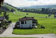 Voll erschlossenes Baugrundstück in 5722 Niedernsill, mit Blick auf die Gipfel der Hohen Tauern