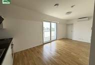 Wohnen im Grünen! Klimatisierte Wohnung mit Weitblick und großer Terrasse in Essling! Lobau und Kirschenallee ums Eck!