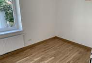 Helle Raumaufteilung und attraktive Lage: frisch sanierte 3-Zimmer-Erdgeschosswohnung mit besonderen Ausstattungsdetails und bezugsfertigem Komfort machen dieses Zuhause zu einer seltenen Gelegenheit!