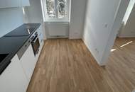 Erstbezug! Helle 2-Zimmer Wohnung mit Parkett und neuer Einbauküche