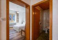 Kärntner Wohncharme in Seenähe – 5-Zimmer-Wohnung mit Kachelofen & Balkon