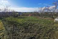 Rarität am Kirchberg – Exklusives Baugrundstück mit unverbaubarem Seeblick