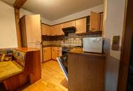 VIEL POTENTIAL FÜR HEIMWERKER! ZENTRALE LAGE MIT BALKON UND TIEFGARGE- ALLES WAS MAN BRAUCHT