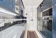 Wohntraum der Extraklasse: Exklusives Penthouse auf 2 Etagen mit großer Terrasse und schönem Garten in begehrter Lage