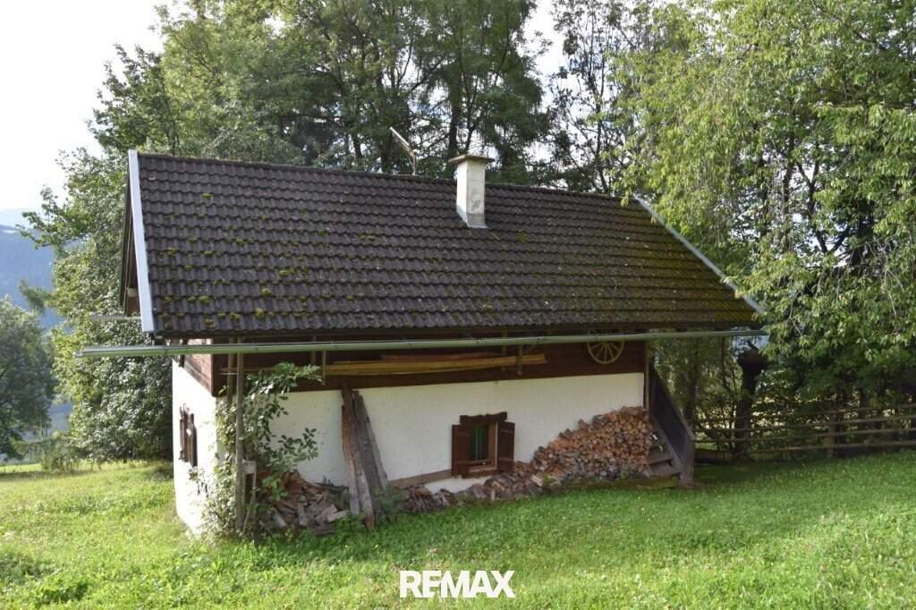 Gemütliche Berghütte mit Nebengebäude am Sonnberg bei Eisentratten mit m² 16.516 arrondierter landwirtschaftlicher Fläche, 3 Zimmer, urige kleine Terrasse, 4 Stellplätze, 290.000 €