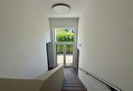 Exklusives Doppelhaushälfte mit sonniger Terrasse, Doppelgarage und Eigengarten!