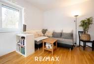 Hochwertige 3-Zimmer-Wohnung mit Tischlerküche, 160 m² Eigengarten, Terrasse und Garage in ruhiger, grüner Lage!