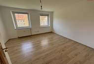 Die Natur vor der Haustüre: Ruhige Grünlage, ohne auf die Vorteile einer hervorragenden Infrastruktur verzichten zu müssen! Schnell sein und diese gemütliche Wohnung mit praktischer Raumaufteilung sichern!