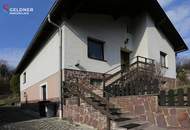 Einfamilienhaus mit eingezäuntem Garten und Garage in absoluter Ruhelage am Waldesrand