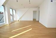 Erstbezug! Schöne Dachgeschosswohnung mit Terrasse