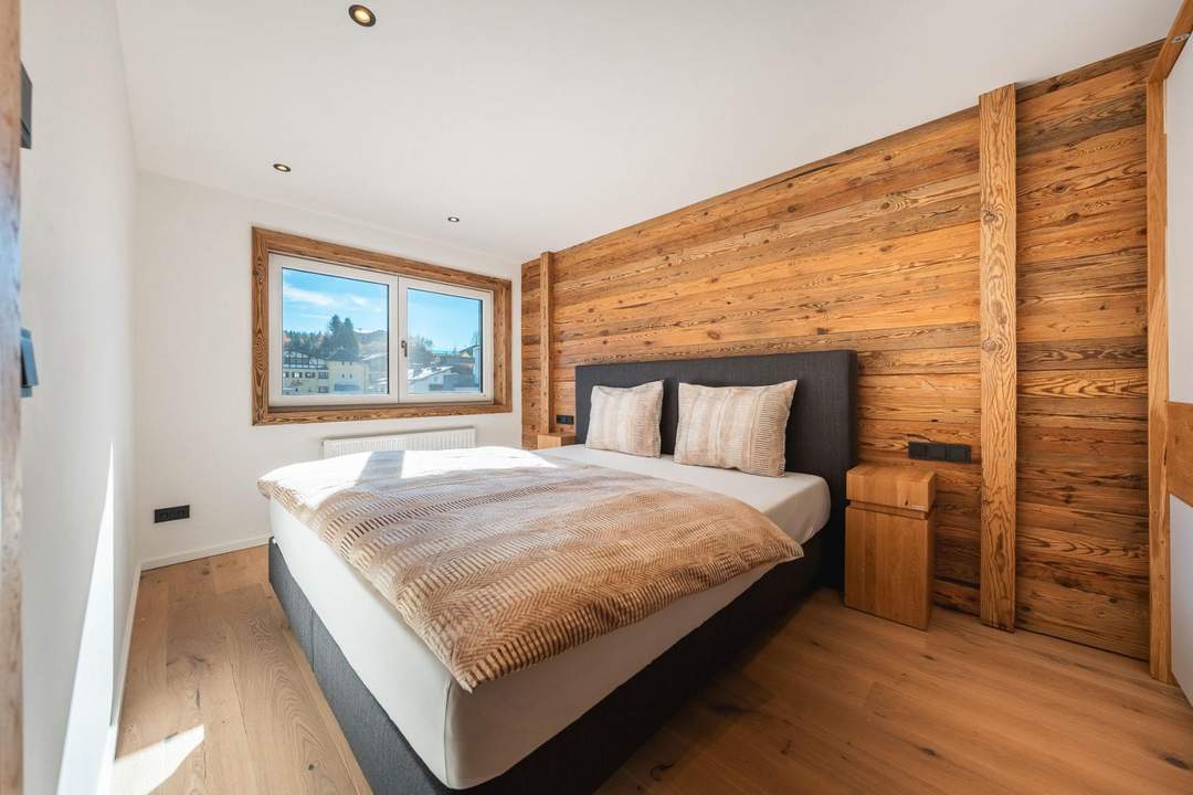 Sanierte Perle mit alpinem Flair: Exklusive 2-Zimmer-Wohnung